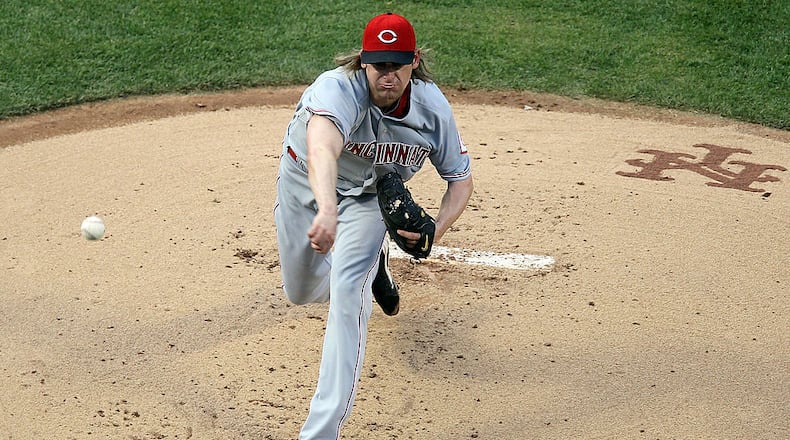 NEW YORK - JULY 07: Bronson Arroyo #61 of the Cincinnati Reds delivers a pitch against the New York Mets on July 7, 2010 at Citi Field in the Flushing neighborhood of the Queens borough of New York City. (Photo by Jim McIsaac/Getty Images)