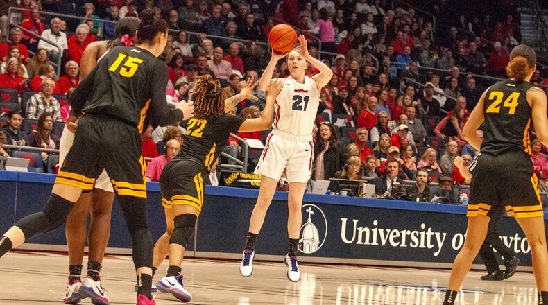 Dayton’s Erin Whalen fires a 3-pointer early in Sunday’s game against VCU at UD Arena. Contributed by Jeff Gilbert