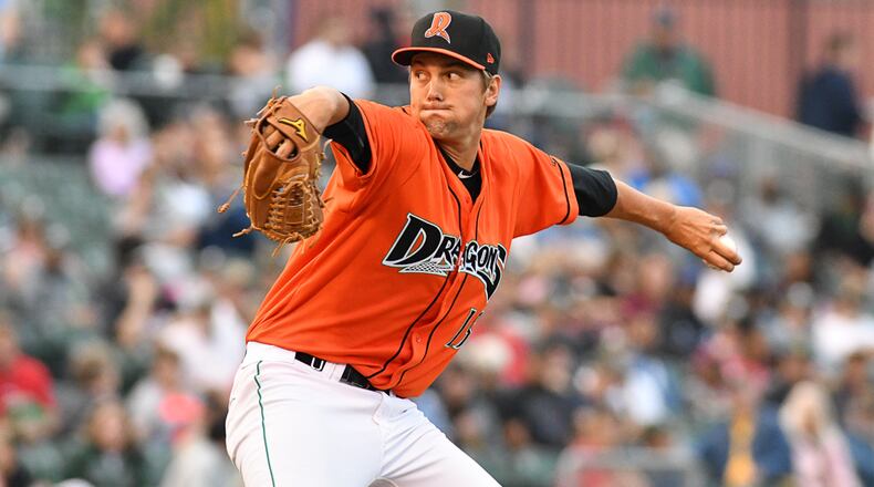 Dragons pitcher Scott Moss throws during a game earlier this season at Fifth Third Field. Contributed Photo by Bryant Billing