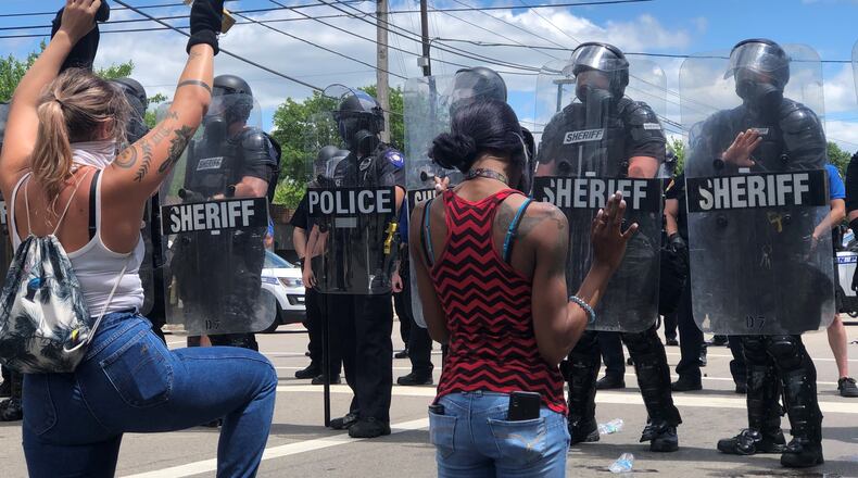 Protesters on Wayne Avenue on Saturday afternoon. CORNELIUS FROLIK / STAFF