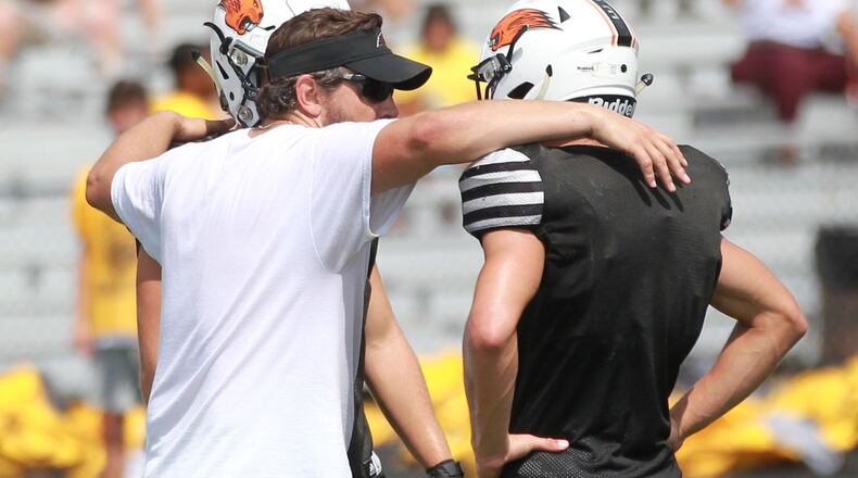 Beavercreek coach Nic Black huddles with the Beavers during a scrimmage against visiting Alter on Saturday, Aug. 17, 2019. MARC PENDLETON / STAFF