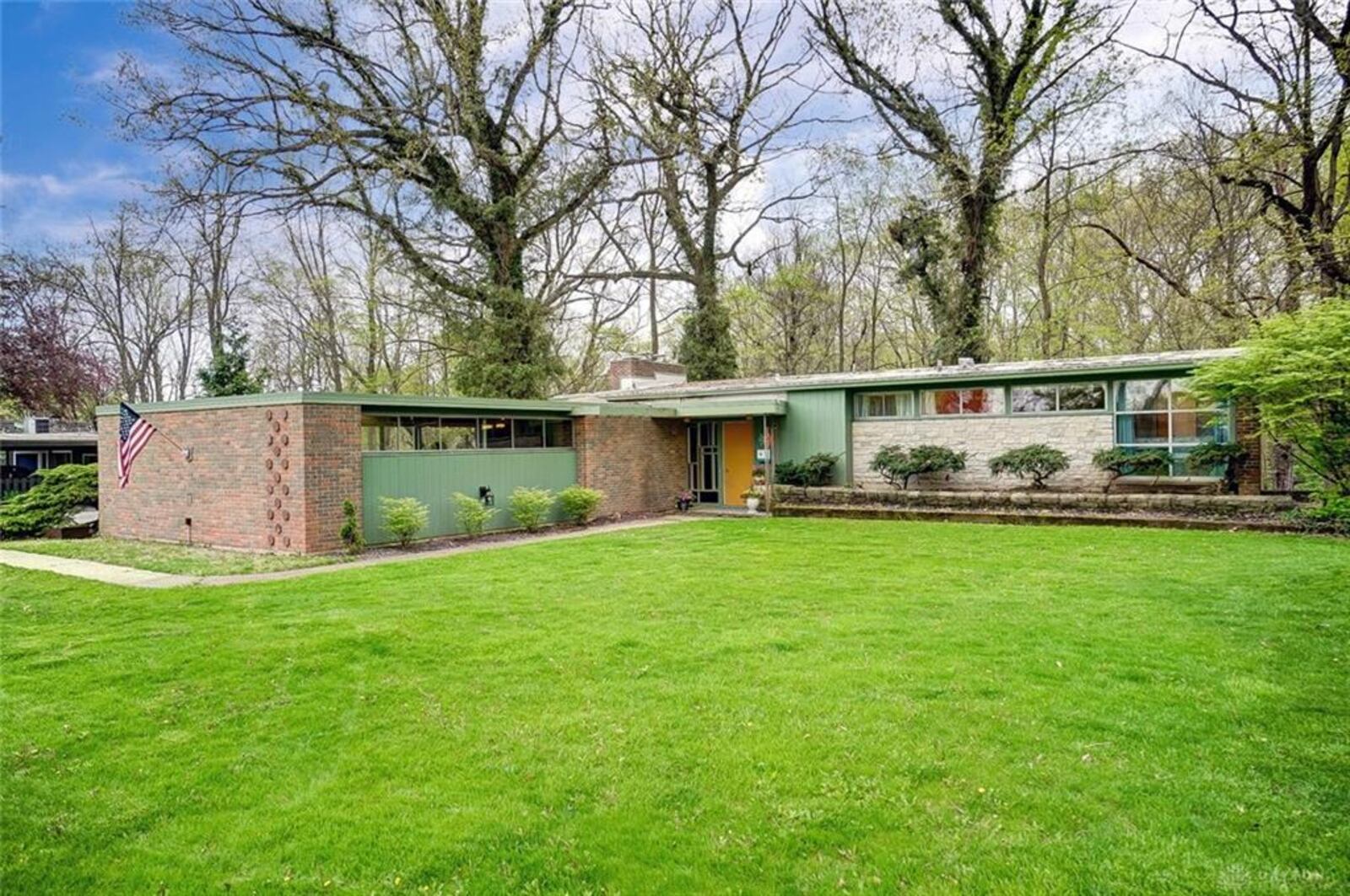 This mid-century home, built in 1958, sits on a wooded, double lot in Dayton. It has three beds and three baths, the listing description said. Throughout the house, there are retro-style finishes including original light fixtures and tile. The house, located at 462 Elm Grove Drive, is listed for $299,900. It was most recently featured on HGTV’s Ethan and Elizabeth Finkelstein’s Instagram account (@cheapoldhouses). PHOTO COURTESY: COLDWELL BANKER HERITAGE