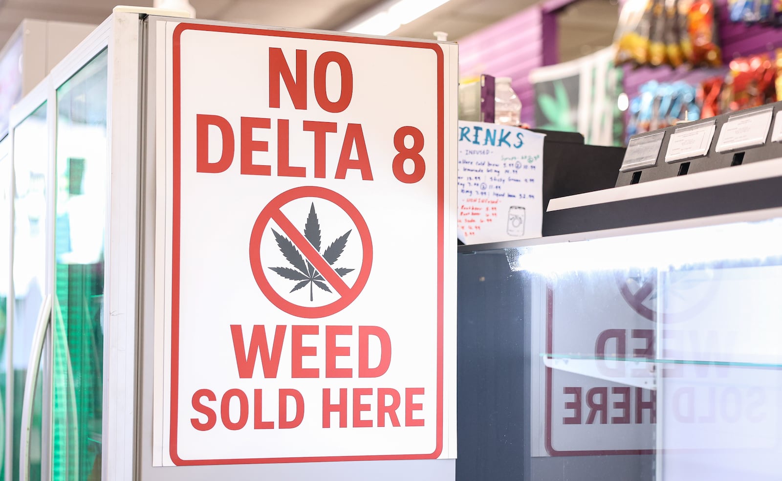 Numerous signs inside and outside Best Buds in Trotwood informs customers no Delta-8 products, the THC found in cannabis, are sold in the store. The 90-day ban Gov. Mike DeWine issued in an order last week on hemp-derived THC products went into effect Tuesday, Oct 14.   BRYANT BILLING / STAFF