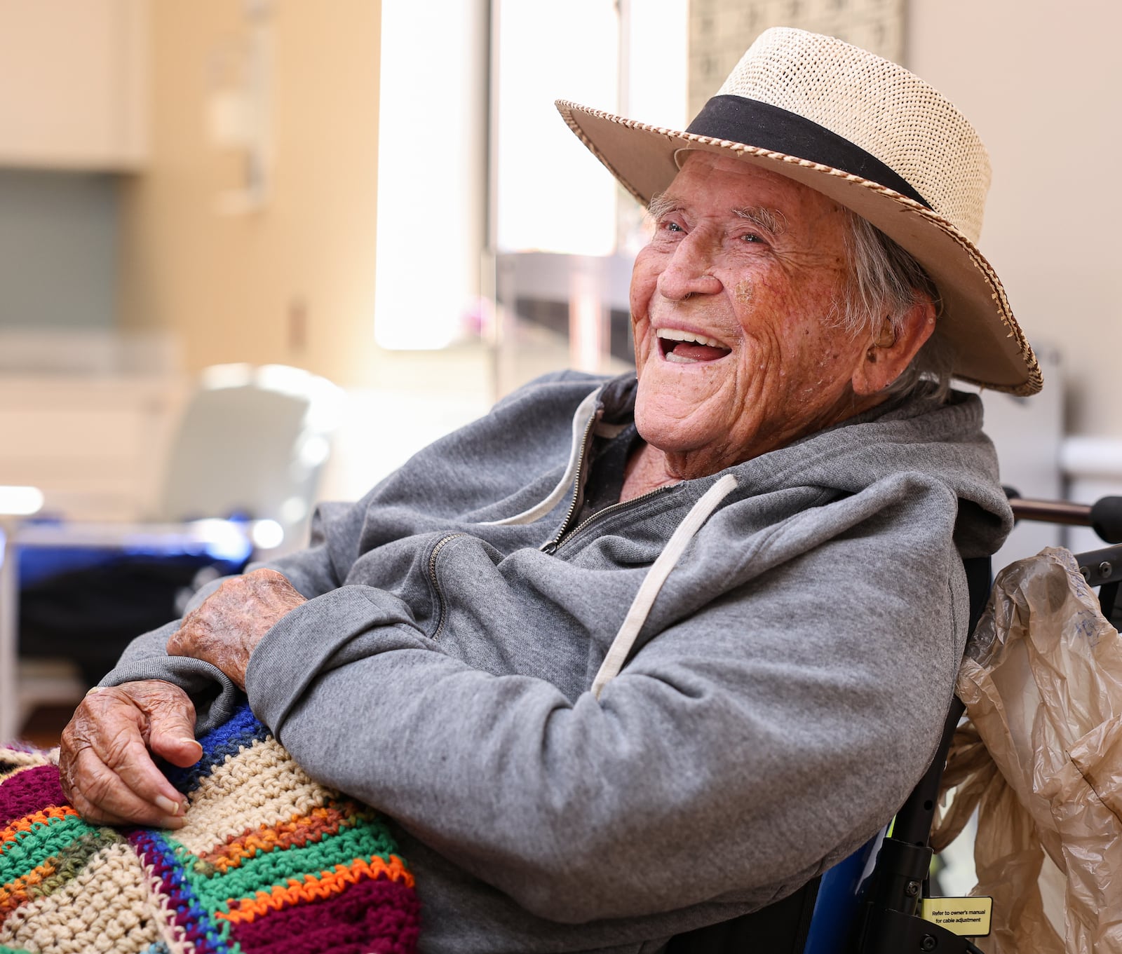 Paul Hughes laughs during an interview on Thursday, Nov. 6 at Community Living Center on the VA campus in Dayton. Hughes served in the Navy for about 20 years and worked primarily as a barber. After retiring from the Navy, he worked as a barber in Dayton. BRYANT BILLING/STAFF