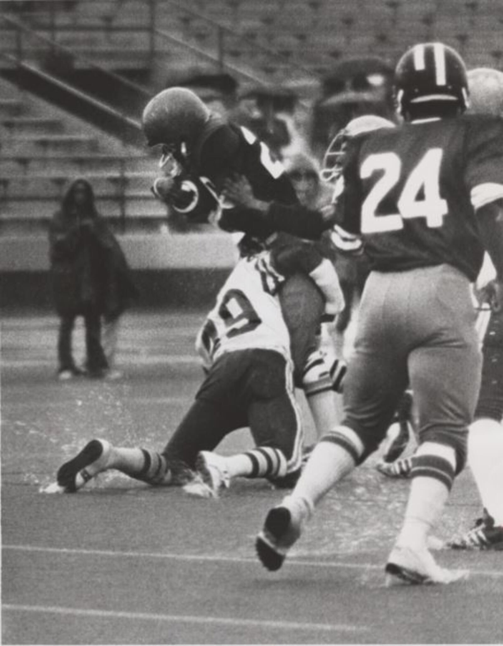 James Pickens of Fairview runs the ball in a game vs. Colonel White during the 1980 season. Courtesy of Wright State University, Dayton Daily News Archive