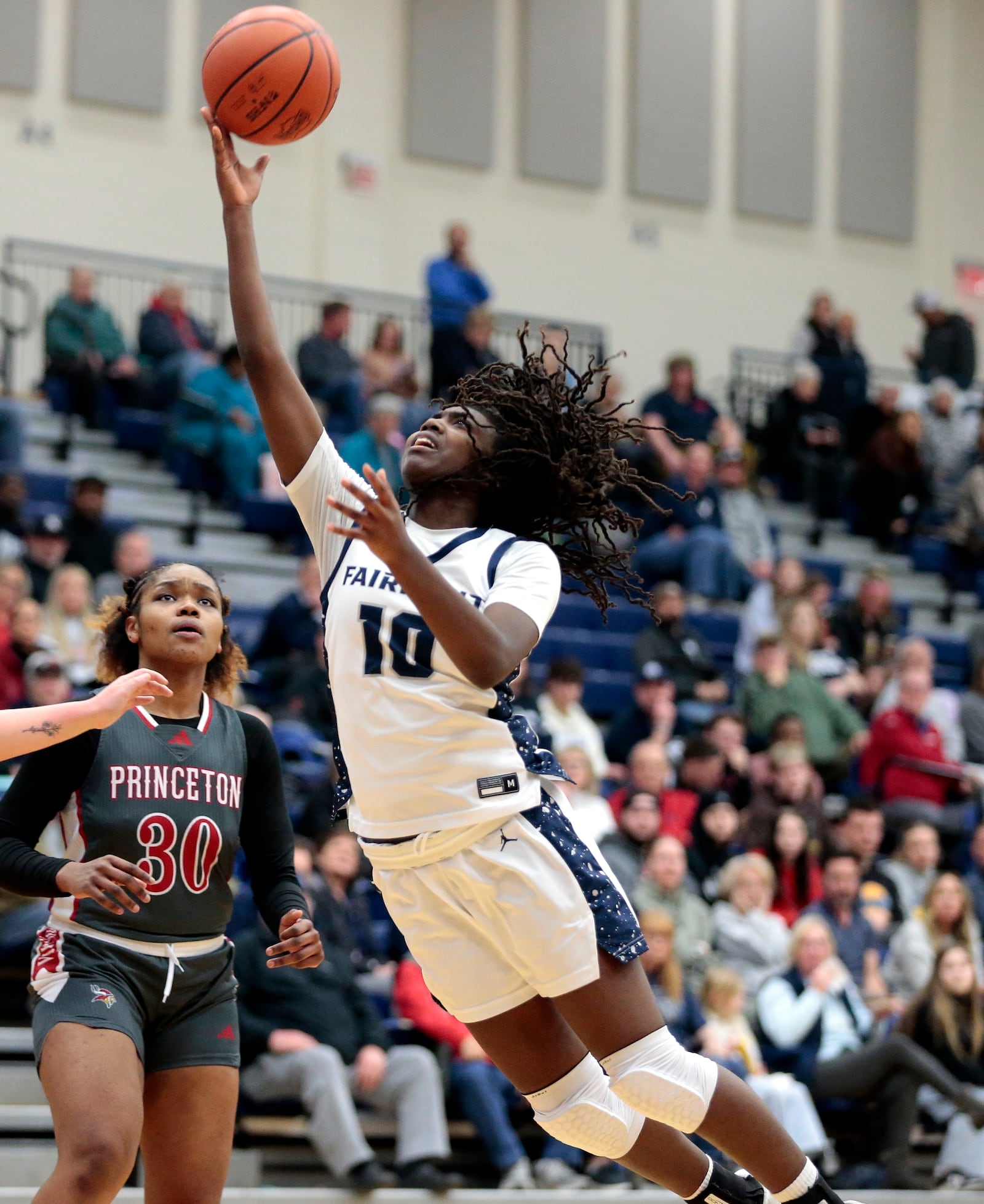 Fairmont sophomore Janiyah Hargrave puts up an acrobatic layup attempt. Fairmont defeated Princeton 57-47 on Monday, Feb. 2, 2026, in Kettering. STEVEN WRIGHT / STAFF