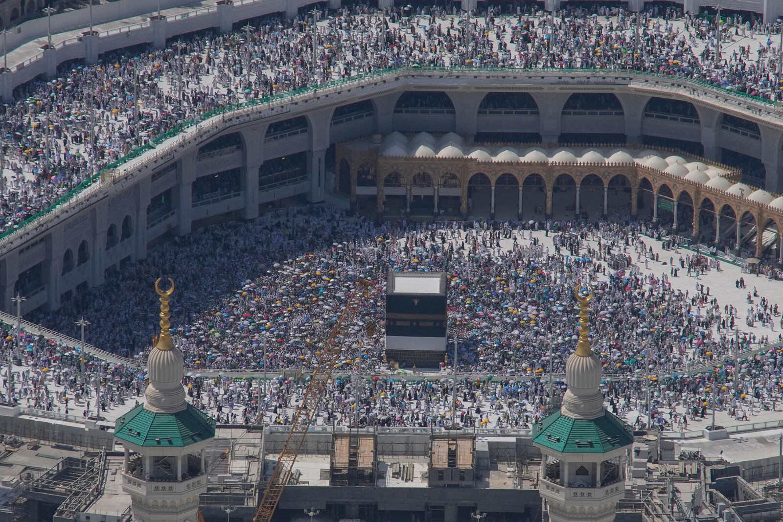 FILE - FILE - Muslim pilgrims circumambulate the Kaaba, the cubic building at the Grand Mosque, during the annual Hajj pilgrimage in Mecca, Saudi Arabia, Monday, June 17, 2024. (AP Photo/Rafiq Maqbool, File, File)