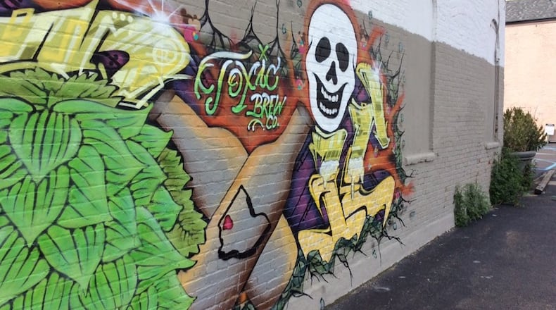 The mural on the side of Toxic Brew Company.