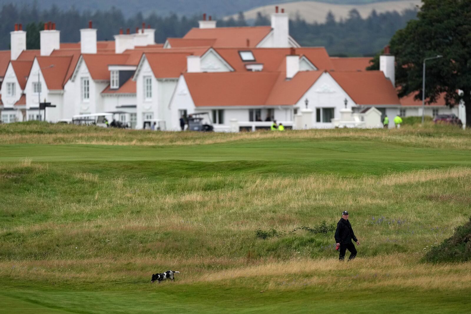 Police forces with dogs search the area at the Trump Turnberry golf course in Turnberry, Scotland, Saturday, July 26, 2025 as President Donald Trump begins his five-day private trip to the country.(AP Photo/Alastair Grant)