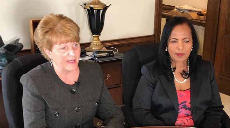 Dayton schools superintendent Elizabeth Lolli (left) and treasurer Hiwot Abraha are tasked with creating and funding a plan to address teacher pay, student health, high school busing and more.