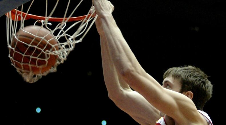 Sean Finn eyes a first half dunk for the UD Flyers. Dayton hosted the George Washington Colonials.