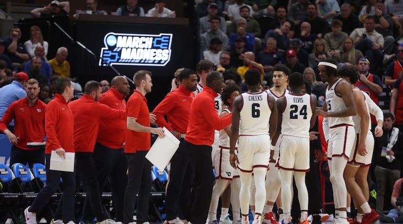 Dayton huddles during a game against Nevada in the first round of the NCAA tournament on Thursday, March 21, 2024, at the Delta Center in Salt Lake City, Utah. David Jablonski/Staff