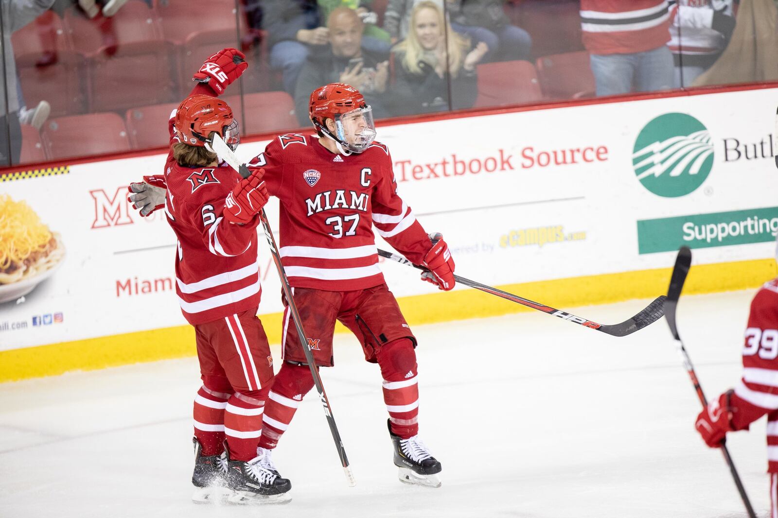 Miami captain Josh Melnick (37) celebrates a goal with teammate Alec Mahalak during a game earlier this season. Photo courtesy of Miami Univeristy