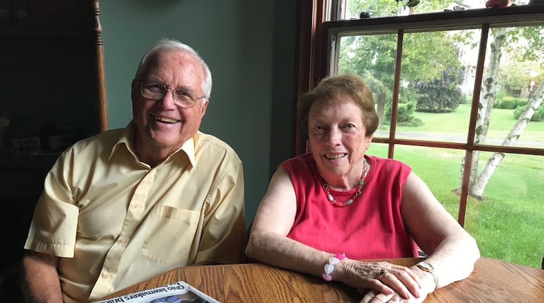 Bruce and Carol Davidson are proud, lifelong Troy Trojans and Bruce is a lifelong subscriber to the Dayton Daily News. STAFF PHOTO / SARAH FRANKS