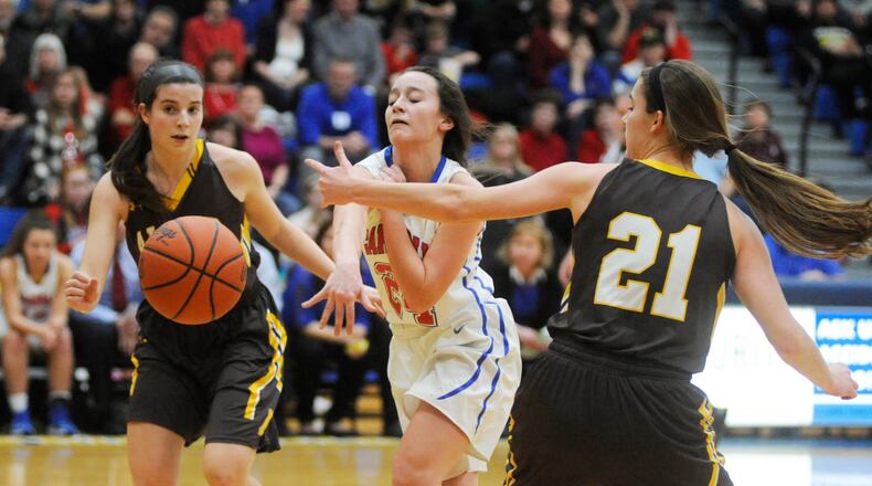 Carroll’s Allie Stefanek (middle) is a three-year starter for top-ranked Carroll. MARC PENDLETON / STAFF