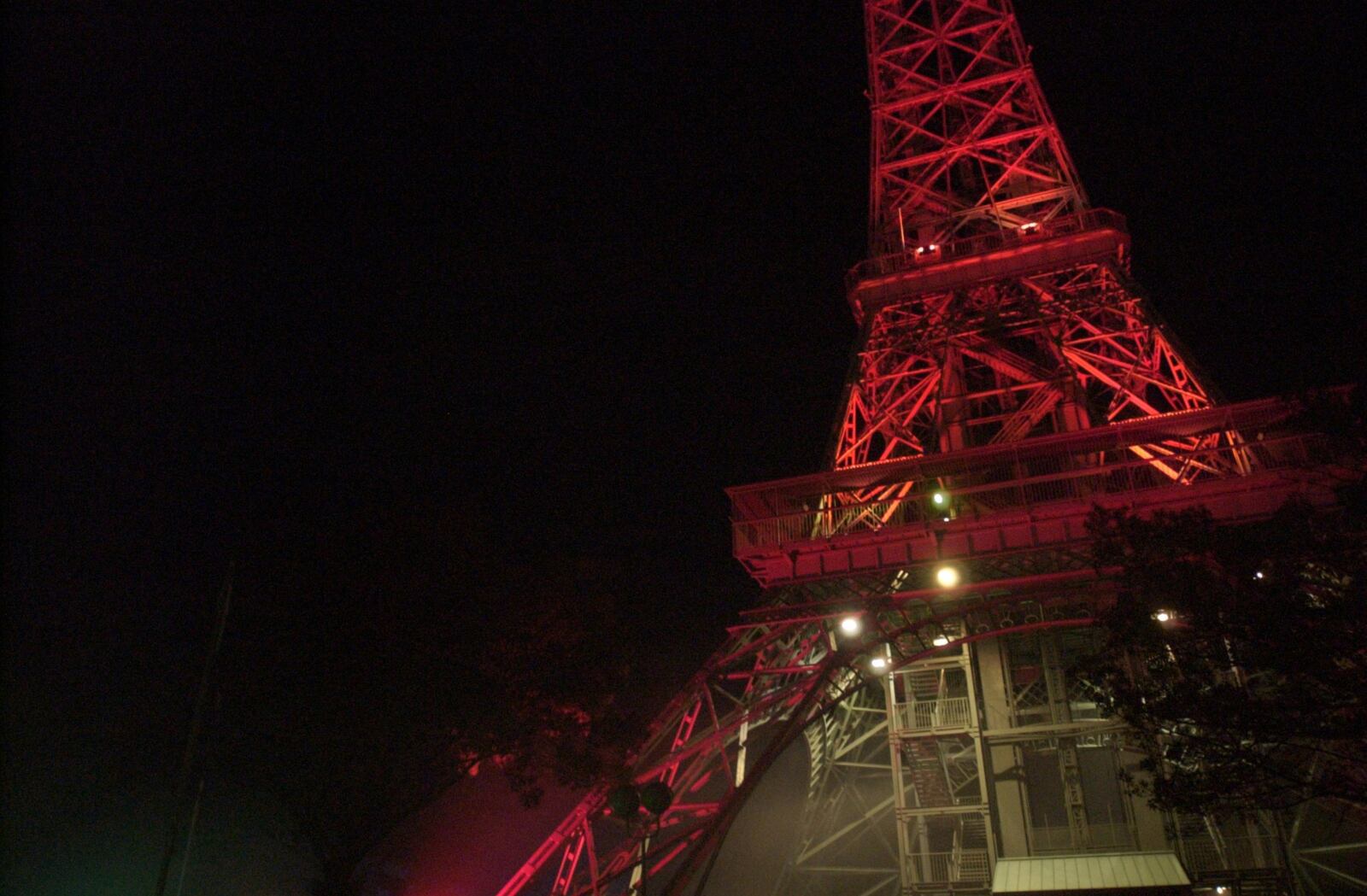 The Eiffel Tower is lit a blood red at Kings Island’s Halloween Haunt. STAFF FILE PHOTO
