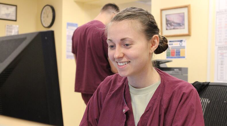 Staff Sgt. Sara Yonek, 88th Inpatient Operations Squadron medical technician and supervisor shift leader, is the first enlisted personnel to win first place for her project during the Ohio State University Center for Transdisciplinary Evidence-Based Practice course held at the United States Air Force School of Aerospace Medicine. Evidence-based practice is an approach to improve a process for patient care based on current data and practices. (U.S. Air Force photos/Stacey Geiger)