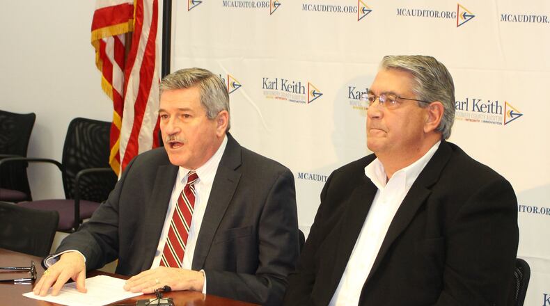 Montgomery County Auditor Karl Keith and Montgomery County Animal Resource Director Bob Gruhl are warning residents about a fake website they say is designed to steal the identities of dog owners looking to purchase or renew their pets’ licenses./CONTRIBUTED