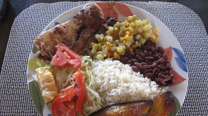 At roadside diners, or sodas, a full meal with meat, rice and beans, salad and maybe some plantains goes for about $5. (Terri Colby/Chicago Tribune/TNS)