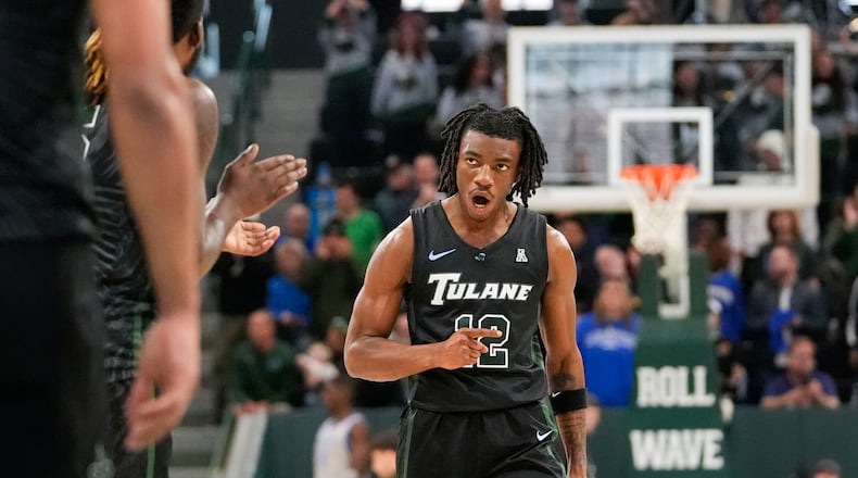 Tulane guard Kolby King (12) reacts during the second half of an NCAA college basketball game against Memphis in New Orleans, Sunday, Jan. 21, 2024. Tulane won 81-79. (AP Photo/Gerald Herbert)