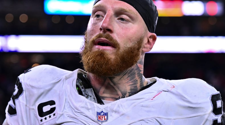 FILE - Las Vegas Raiders defensive end Maxx Crosby (98) looks on after an NFL football game against the Houston Texans, Sunday, Dec. 21, 2025, in Houston. (AP Photo/Maria Lysaker,File)