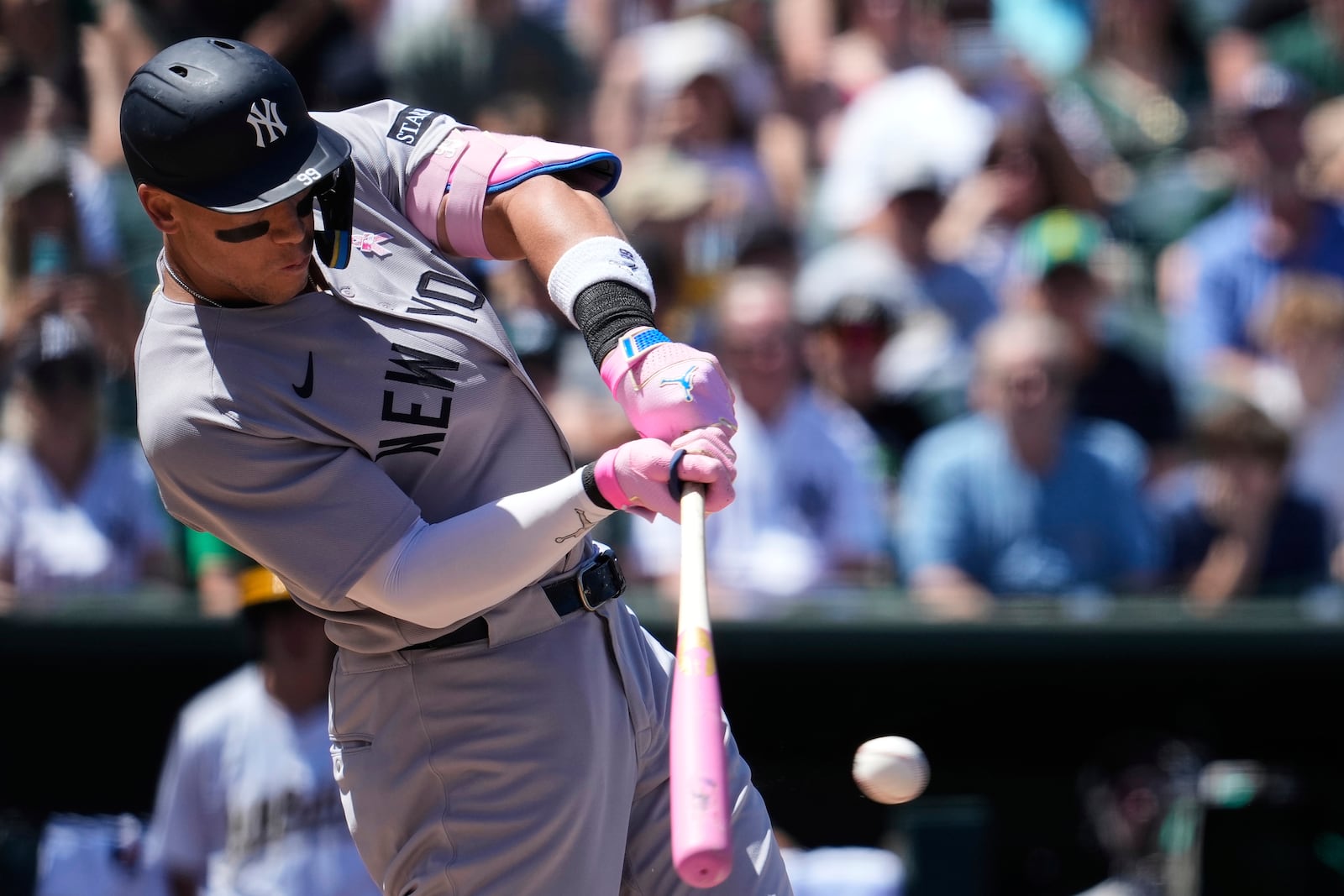 New York Yankees' Aaron Judge hits a double during the fourth inning of a baseball game against the Athletics, Sunday, May 11, 2025, in West Sacramento, Calif. (AP Photo/Godofredo A. Vásquez)