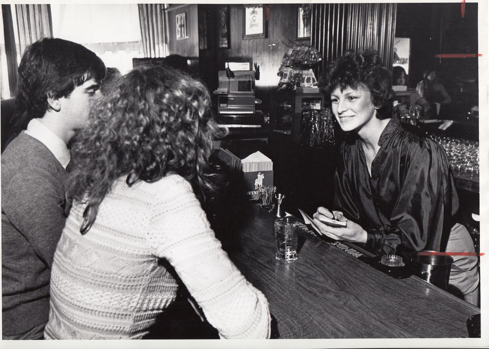 Toya Menker  serves lunch customers at Century Bar in the January 26, 1982 photo by Wally Nelson.