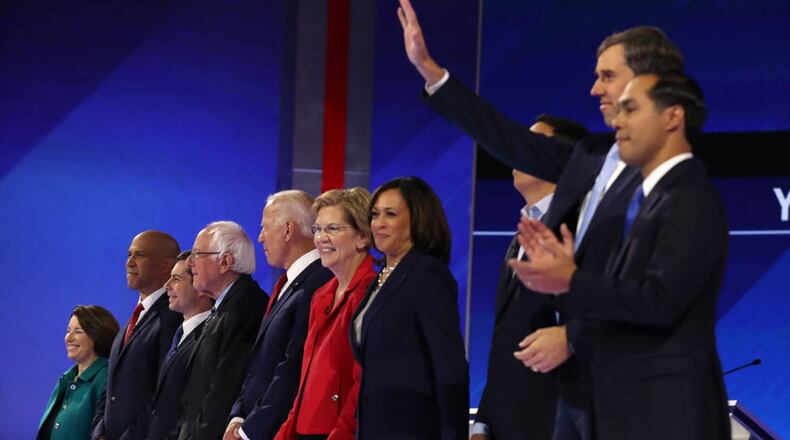 Democratic presidential candidates — including U.S. Sen. Amy Klobuchar, from left, U.S. Sen. Cory Booker, South Bend, Ind., Mayor Pete Buttigieg, U.S. Sen. Bernie Sanders, former Vice President Joe Biden, U.S. Sen. Elizabeth Warren, U.S. Sen. Kamala Harris, former tech executive Andrew Yang, former U.S. Rep. Beto O’Rourke and former Housing Secretary Julian Castro — are set to appear at the party’s fourth 2020 primary debate, set for Tuesday at Otterbein University in Westerville, Ohio. (Justin Sullivan/Getty Images/TNS)