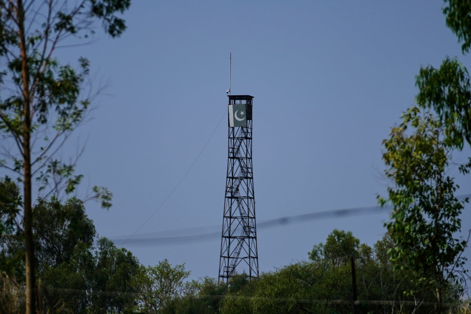An empty Pakistani military post is seen from Indian side from Suchetgarh village after the two countries reported no incidents of firing overnight, Monday, May 12, 2025. (AP Photo/Channi Anand)