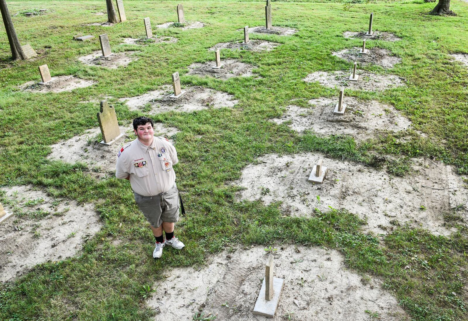 With help from fellow Troop 29 Boy Scouts, C.J. Castle completed a restoration project at Old Jacksonburg Cemetery in Wayne Township. 