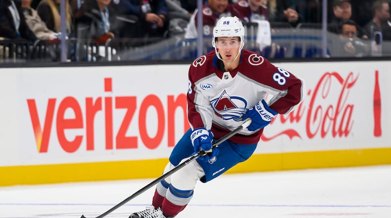 Colorado Avalanche center Martin Necas (88) skates the puck to the net leading to a goal during the third period of an NHL hockey game against the Utah Mammoth, Tuesday, Oct. 21, 2025, in Salt Lake City, Utah. (AP Photo/Tyler Tate)