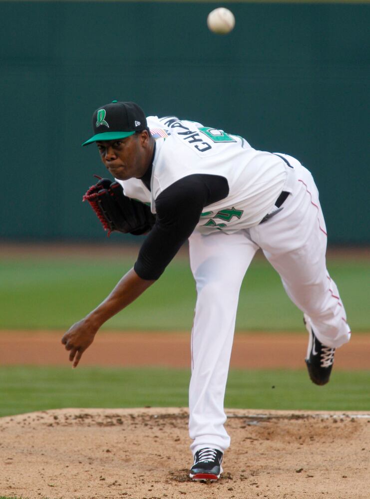 Reds Chapman Pitches for Dragons