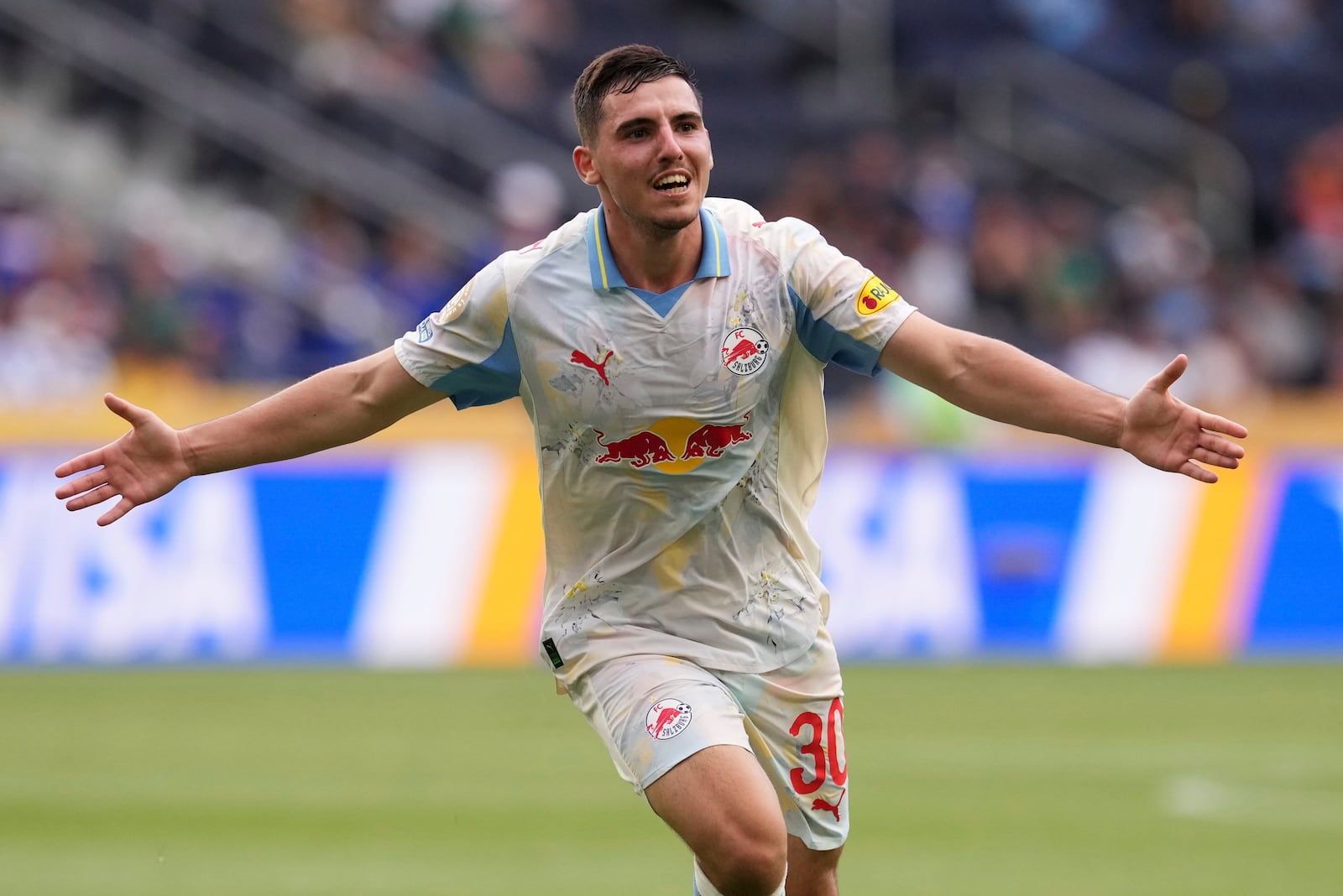 Red Bull Salzburg's Oscar Gloukh celebrates after scoring his side's opening goal during the Club World Cup group H soccer match between CF Pachuca and FC Salzburg in Cincinnati, Wednesday, June 18, 2025. (AP Photo/Jeffrey Dean)