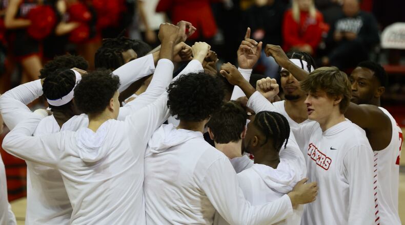 Dayton huddles before a game against UNLV on Tuesday, Nov. 15, 2022, at the Thomas & Mack Center in Las Vegas, Nev. David Jablonski/Staff