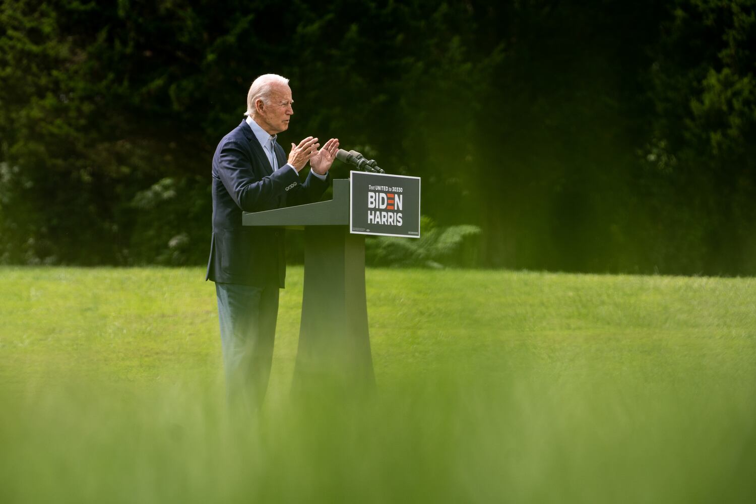 Joe Biden, Democratic presidential nominee, speaks outside the Delaware Museum of Natural History in Wilmington, Del., Sept. 14, 2020. President Donald Trump visited California after weeks of silence on its wildfires and blamed the crisis only on poor forest management, not climate change. Biden called him a “climate arsonist.” (Erin Schaff/The New York Times)
