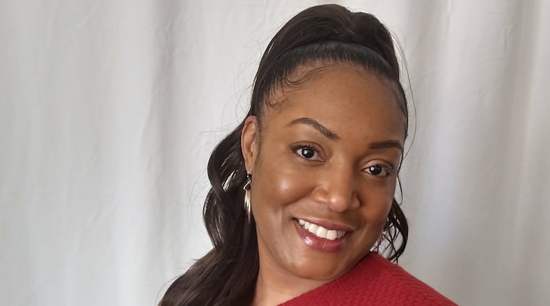 Kettering Health scheduler Jessica Tilley, who was able to help a patient get emergency medical care after he experienced a seizure over the phone. CONTRIBUTED