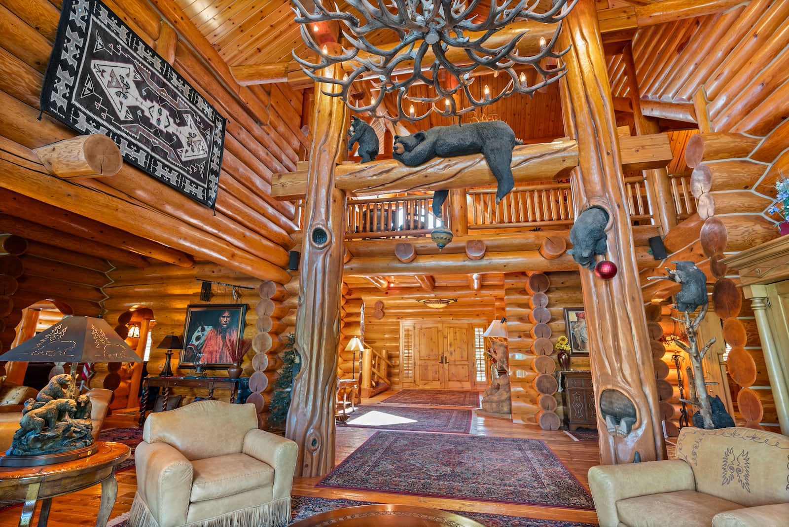 The 7,000-square-foot custom log home features 33 custom bear carvings by Wyoming artist Jonathan LaBenne, who spent six weeks completing the carvings inside and out at Saguaro Ranch outside Waynesville in Warren County. CONTRIBUTED
