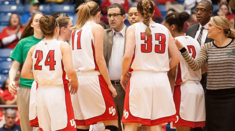 Dayton Womens Flyers Coach Jim Jabir looks to forward Ally Mallott (11) during a timeout after she sank a three point basket during the first half of the game against their rival the Xavier Musketeers, Thursday, February 7, 2013, at the University of Dayton Arena. Photo by Rob Leifheit/Contributing Photographer