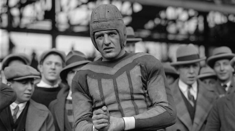 Red Grange on the sideline during one of the NFL games he played as a Chicago Bear in late 1925. (Photo courtesy Library of Congress/TNS)