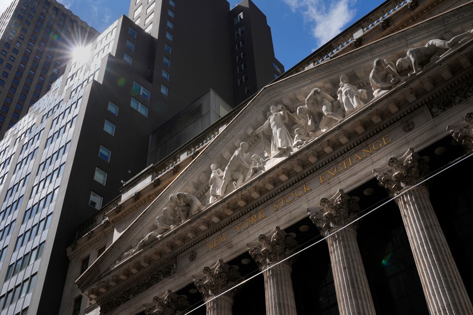 The New York Stock Exchange is seen in New York, Tuesday, April 8, 2025. (AP Photo/Seth Wenig)
