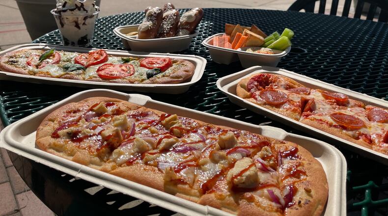 The RiverScape Café in downtown Dayton is now open 5 to 9 p.m. Tuesday through Saturday with a happy hour from 5 to 7 p.m. NATALIE JONES/STAFF