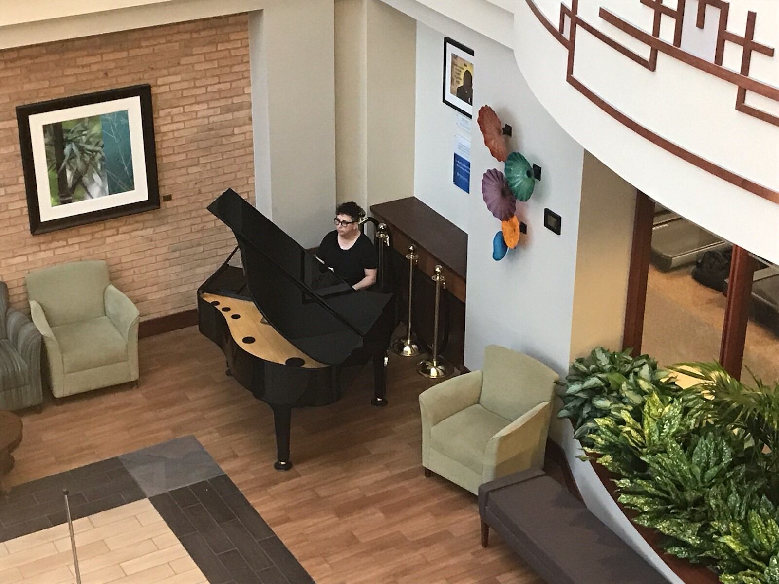 A piano once at Good Samaritan is now in the lobby at Miami Valley Hospital North. KAITLIN SCHROEDER
