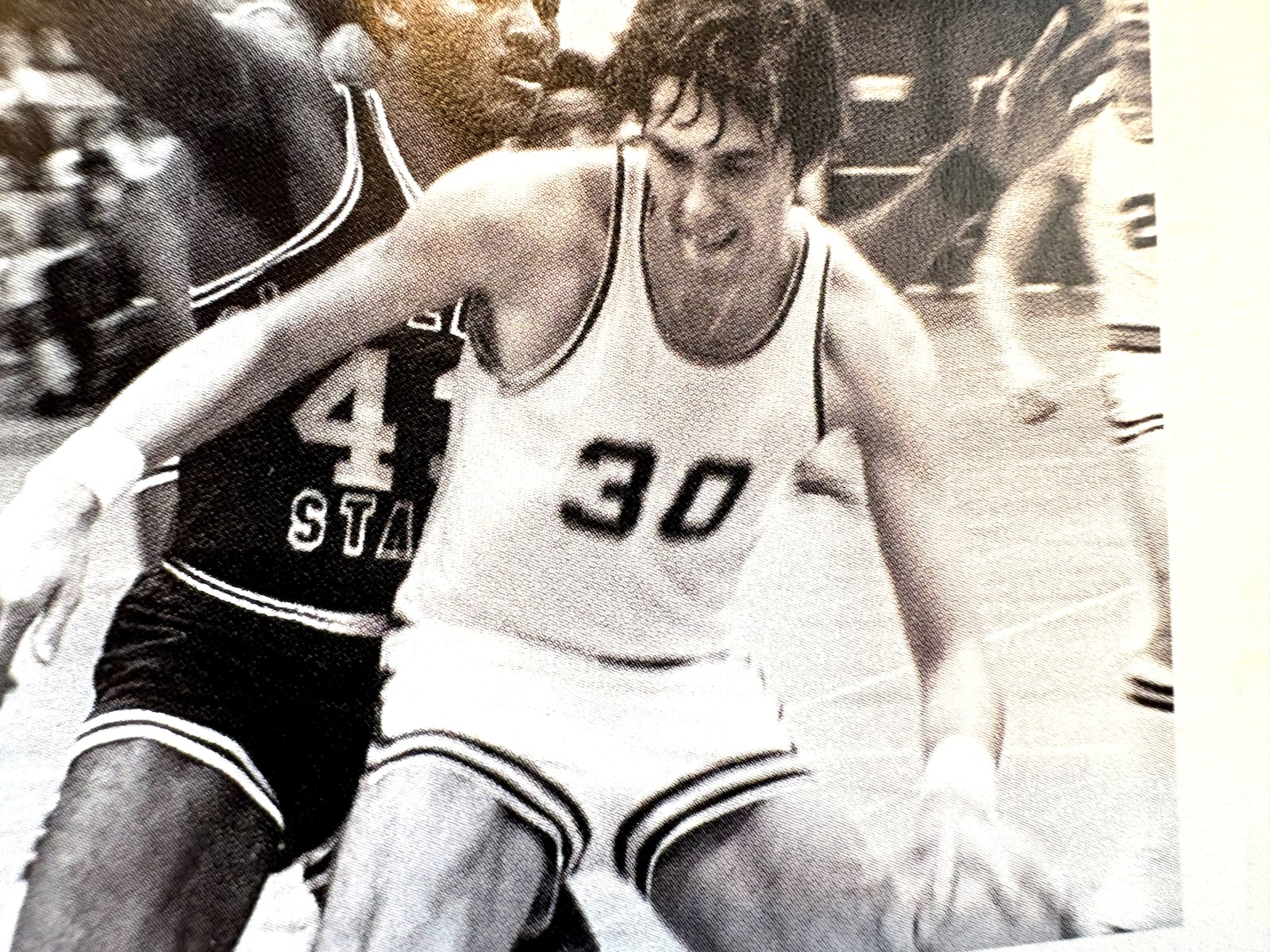 Bob Grote handles the ball for Wright State. A two-sports star, he was the school’s first All-American basketball player and the first WSU athlete ever to sign a pro contract after he was drafted in the 12th round by the New York Mets. He is No. 18 on the list of all-time career scorers in basketball with 1,406 points. CONTRIBUTED PHOTO