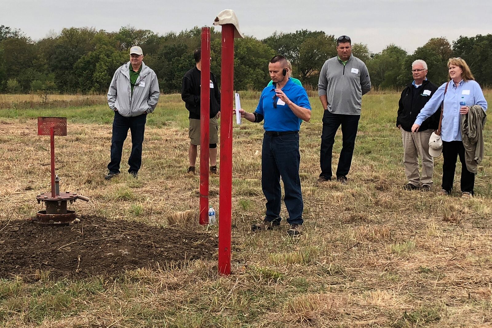 FILE - NioCorp Chief Operating Officer Scott Honan tells a group of investors about the plans for a proposed mine in southeast Nebraska, on Oct. 6, 2021 in Elk Creek, Neb. (AP Photo/Josh Funk, File)