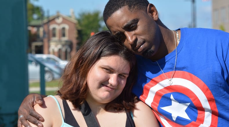 Britaney Jones and Brian Pinson were out the night of the Aug. 4 Oregon District shooting. Jones was shot in the left hand and lost her thumb. Pinson was shot in the lower back and suffered a flesh wound. STAFF PHOTO