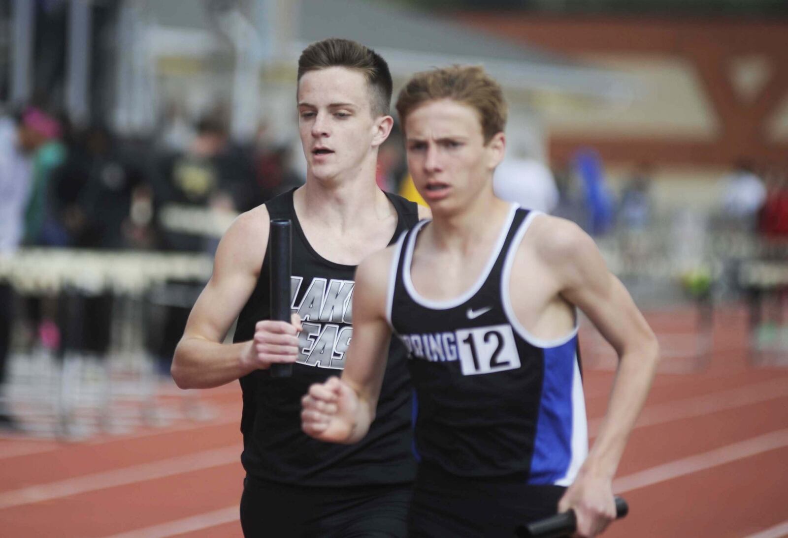 Lakota East High School junior Dustin Horter (left) anchored the distance medley relay from 12th to third during the Wayne track and field invitational at Huber Heights on Thursday, April 27, 2017. MARC PENDLETON / STAFF