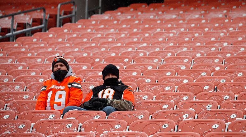 CLEVELAND, OH - DECEMBER 11: Fans of the Cleveland Browns and the Cincinnati Bengals sit together before the game at Cleveland Browns Stadium on December 11, 2016 in Cleveland, Ohio. (Photo by Justin K. Aller/Getty Images) *** Local Caption ***