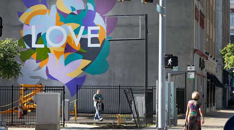 A mural by Dayton artist Amy Deal was recently completed on the north wall of the Stage Door, 44 N. Jefferson St. in Dayton. The art piece was inspired by Paul Laurence Dunbar's poem, "The Dove." LISA POWELL / STAFF