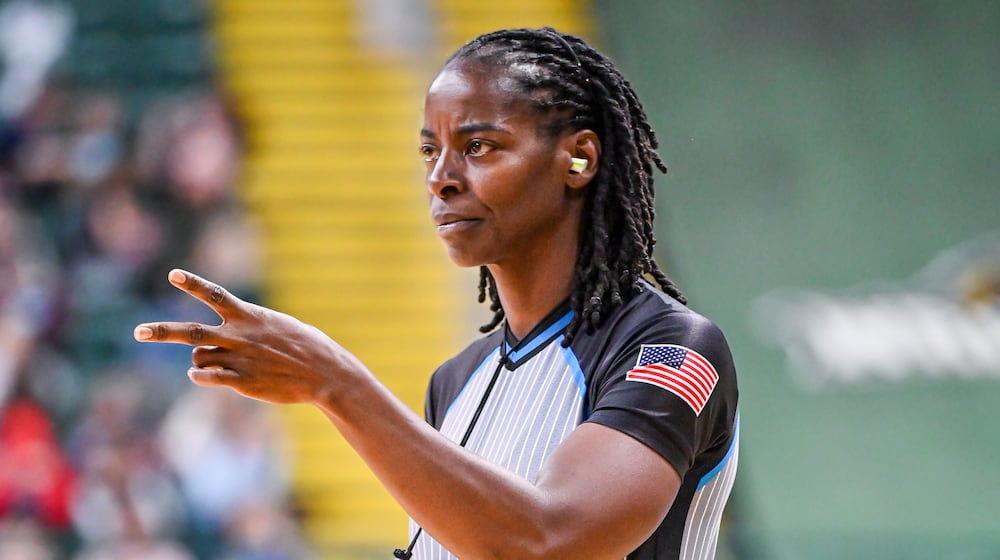 Linda Miles officiates at a recent Wright State basketball game. BRYANT BILLING/STAFF
