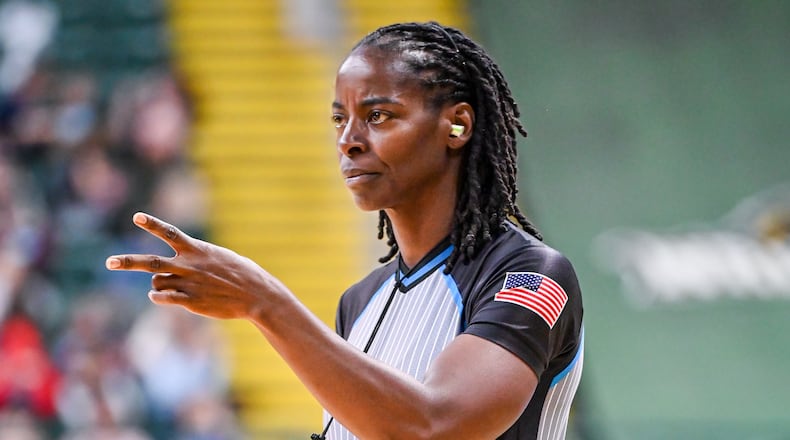 Linda Miles officiates at a recent Wright State basketball game. BRYANT BILLING/STAFF